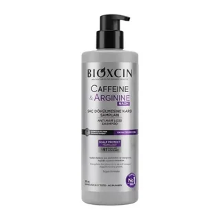 شامپو سر ضد ریزش بیوکسین BIOXCIN حاوی کافئین و آرژینین حجم ۵۰۰میل