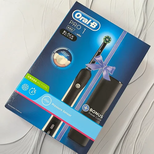 مسواک برقی اورالبی ORAL-B سری CROSS ACTION مدل PRO1 680 همراه جعبه مسافرتی