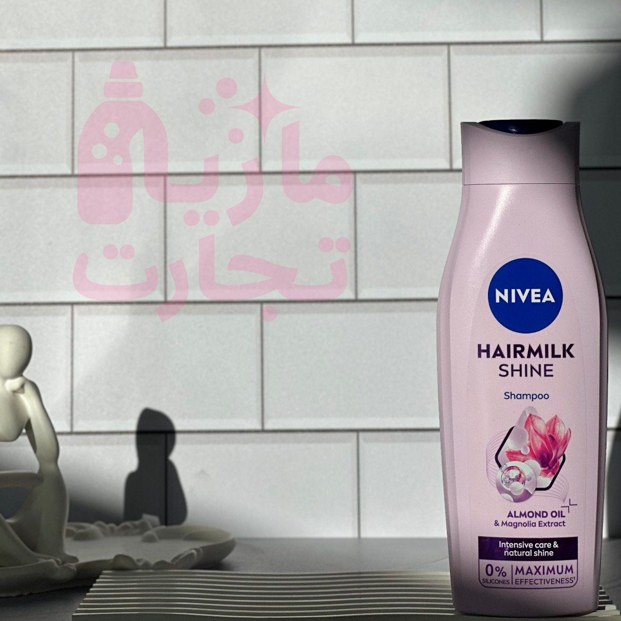 شامپو سر نیوا NIVEA مدل مراقبت‌کننده و درخشان کننده حاوی روغن بادام و عصاره ماگنولیا ۴۰۰میل