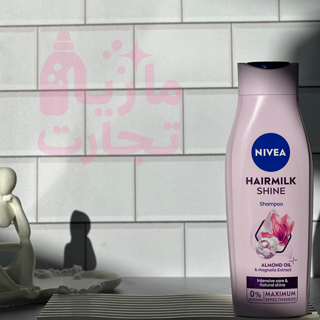 شامپو سر نیوا NIVEA مدل مراقبت‌کننده و درخشان کننده حاوی روغن بادام و عصاره ماگنولیا ۴۰۰میل